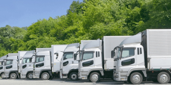 国の拠点からリペアセンターへ到着したトラックイメージ